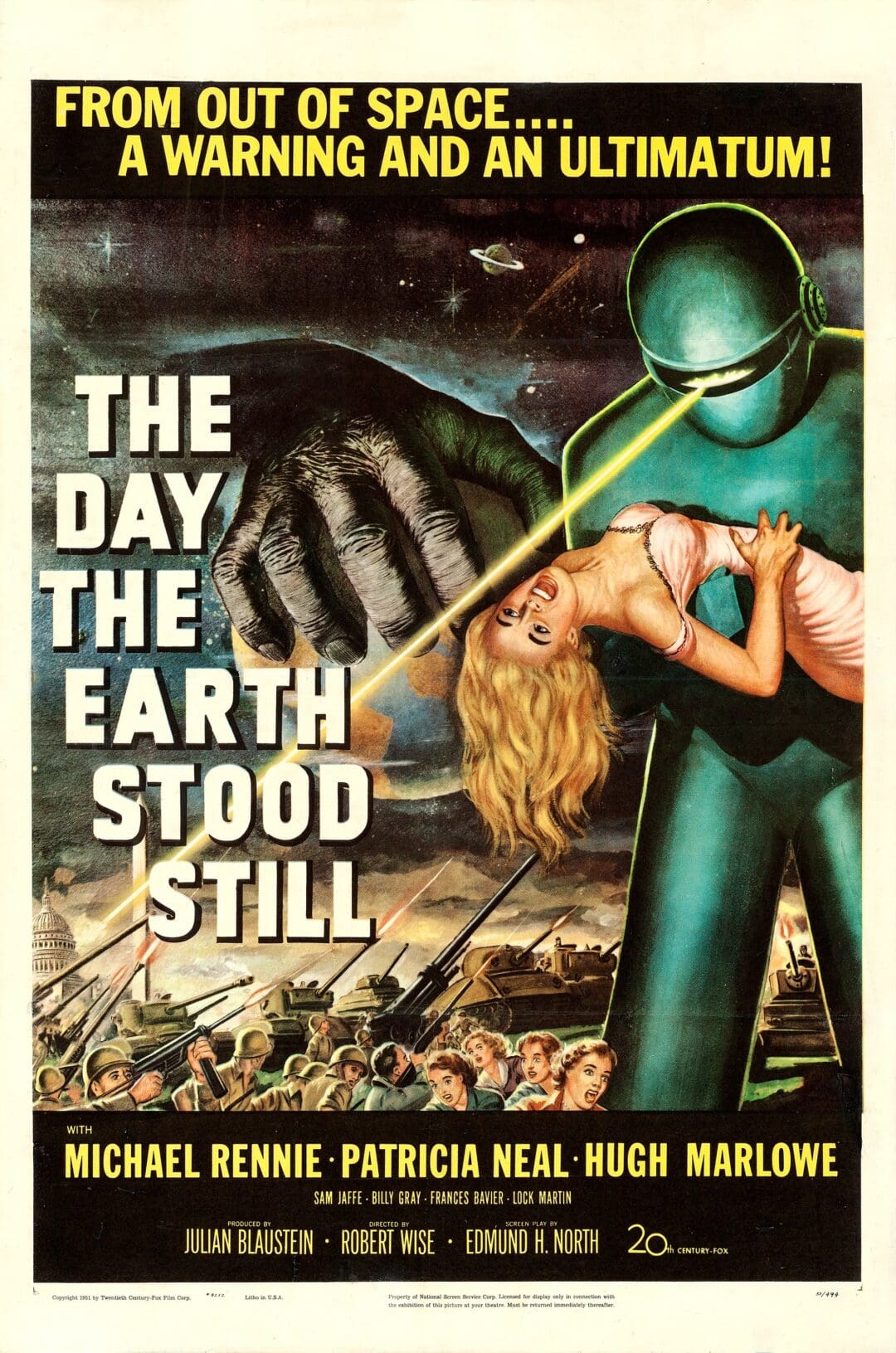 Classic sci-fi film poster showing a robot holding an unconscious woman.